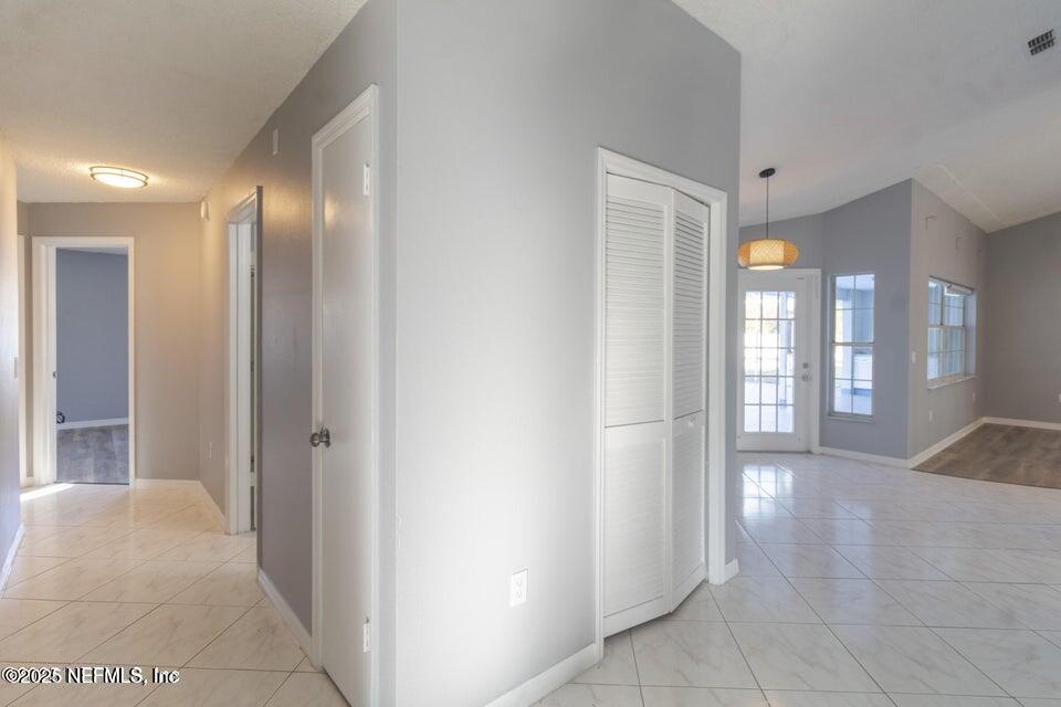 3955 Southwest 139th St Road Ocala, FL 34473 - Photo 12 of 45 a view of livingroom with hardwood floor and windows