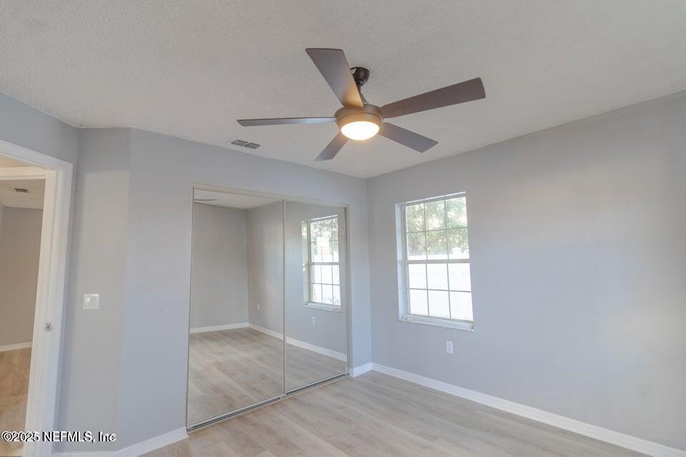 3955 Southwest 139th St Road Ocala, FL 34473 - Photo 21 of 45 a view of an empty room with a window