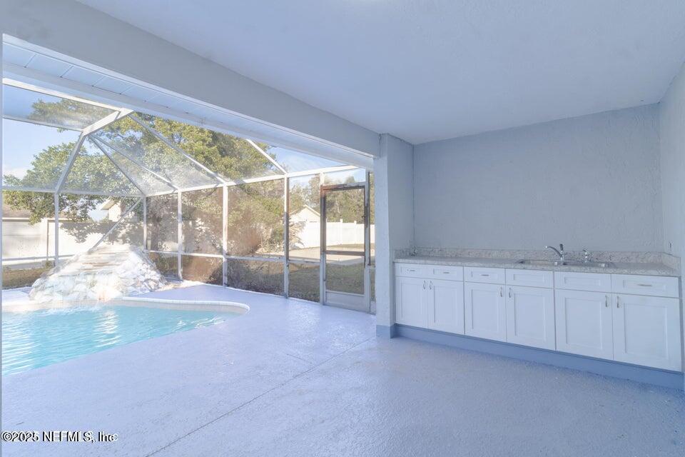 3955 Southwest 139th St Road Ocala, FL 34473 - Photo 24 of 45 a view of an empty room and window