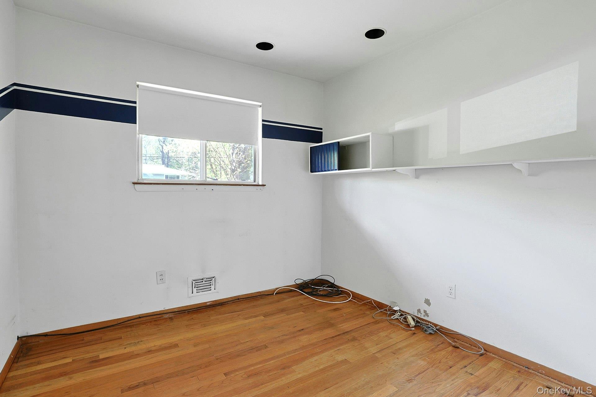 44 Southgate Drive Spring Valley, NY 10977 - Photo 13 of 24 a view of empty room with wooden floor and fan