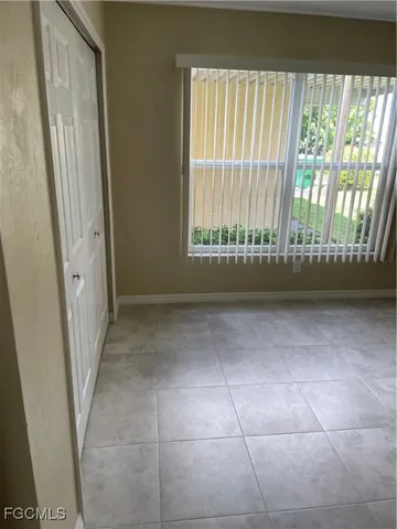 a view of a lake with a yard