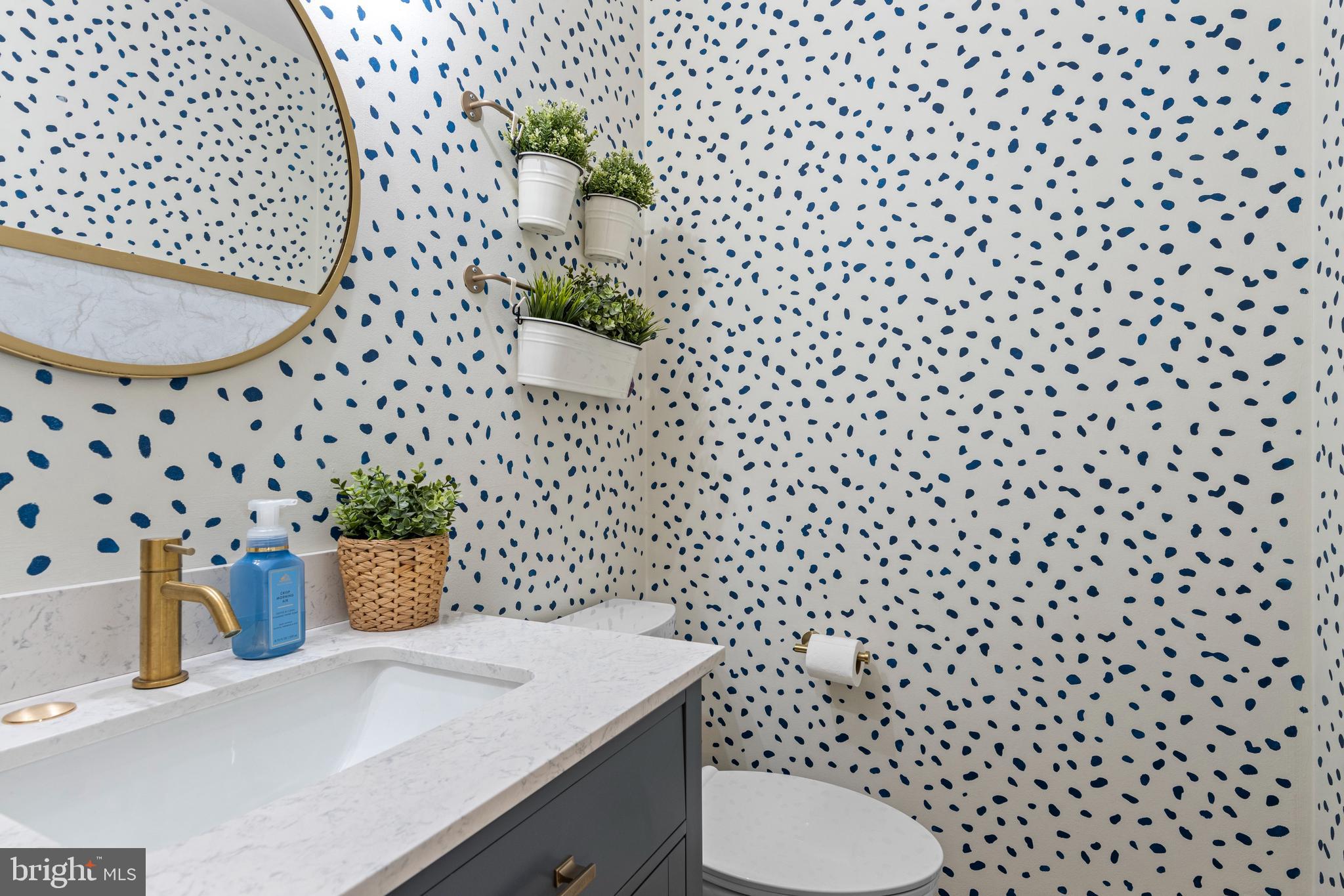 649 Niblick Lane, Unit 20 Wallingford, PA 19086 - Photo 20 of 35 a bathroom with a sink and a toilet
