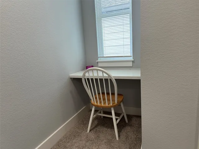 a chair and a table in a room