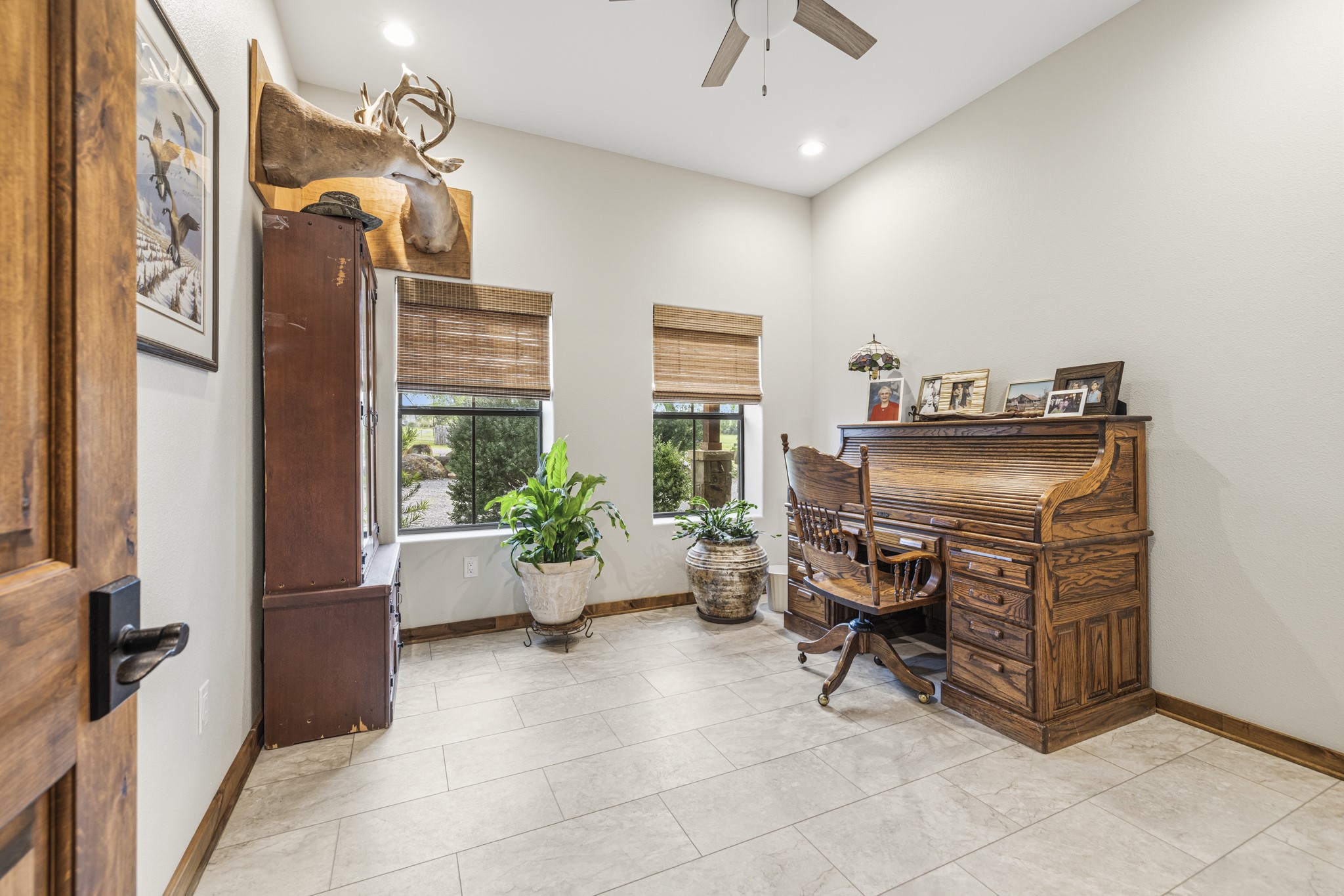 3724 Ranch Road 3347 Round Mountain, TX 78663 - Photo 16 of 40 a view of a workspace with furniture and a window