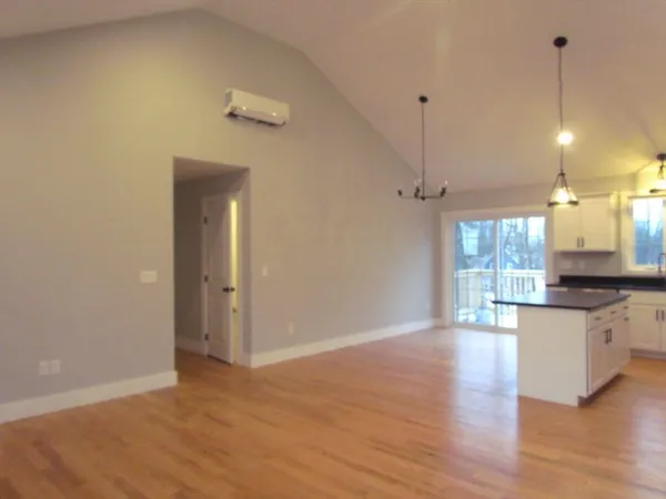 a view of a kitchen and a window