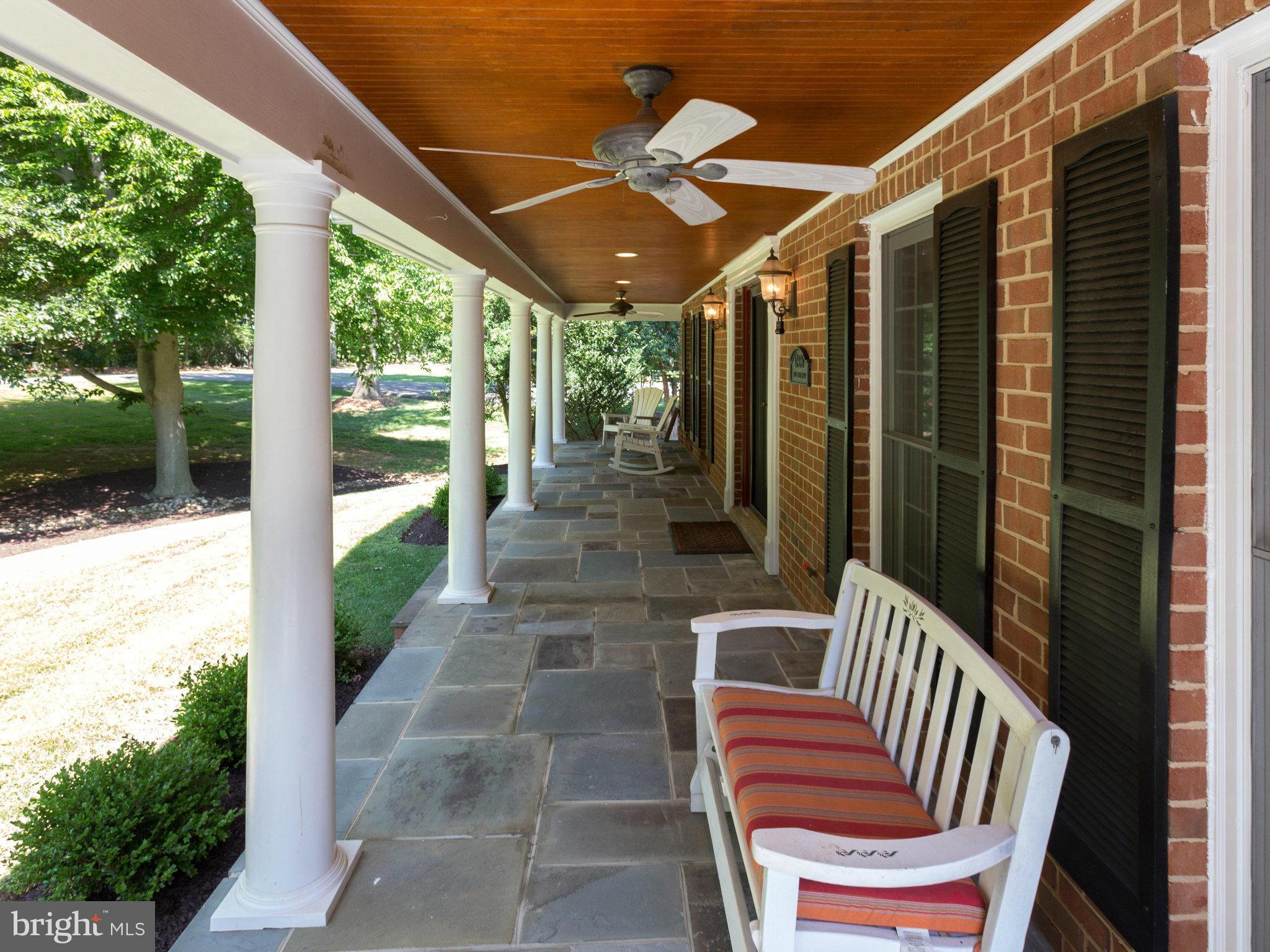 Relax on Flagstone Porch w Wood Ceiling.