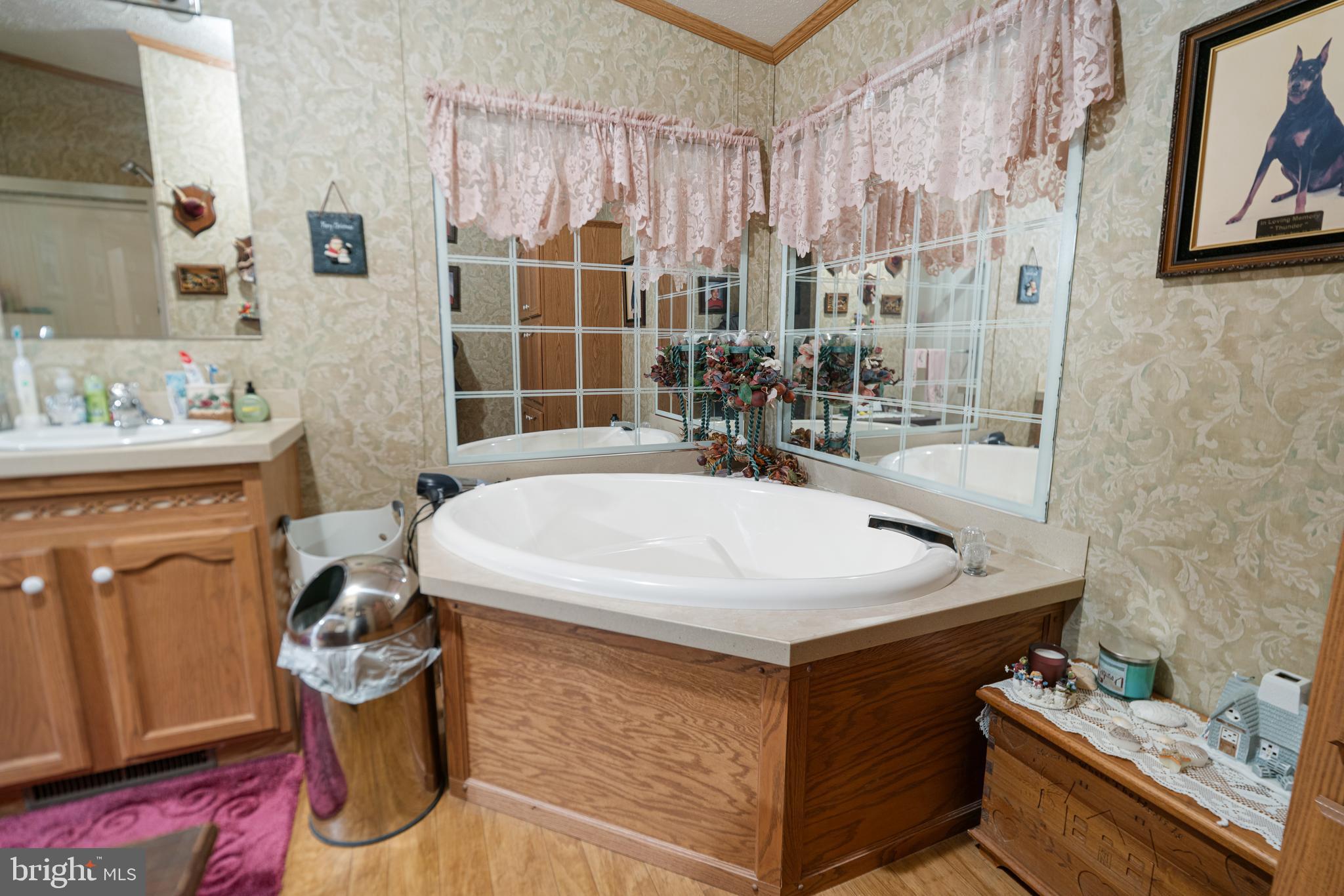 701 Cassel Road, Unit 107 Manchester, PA 17345 - Photo 12 of 21 a bathroom with a sink a toilet and shower curtain