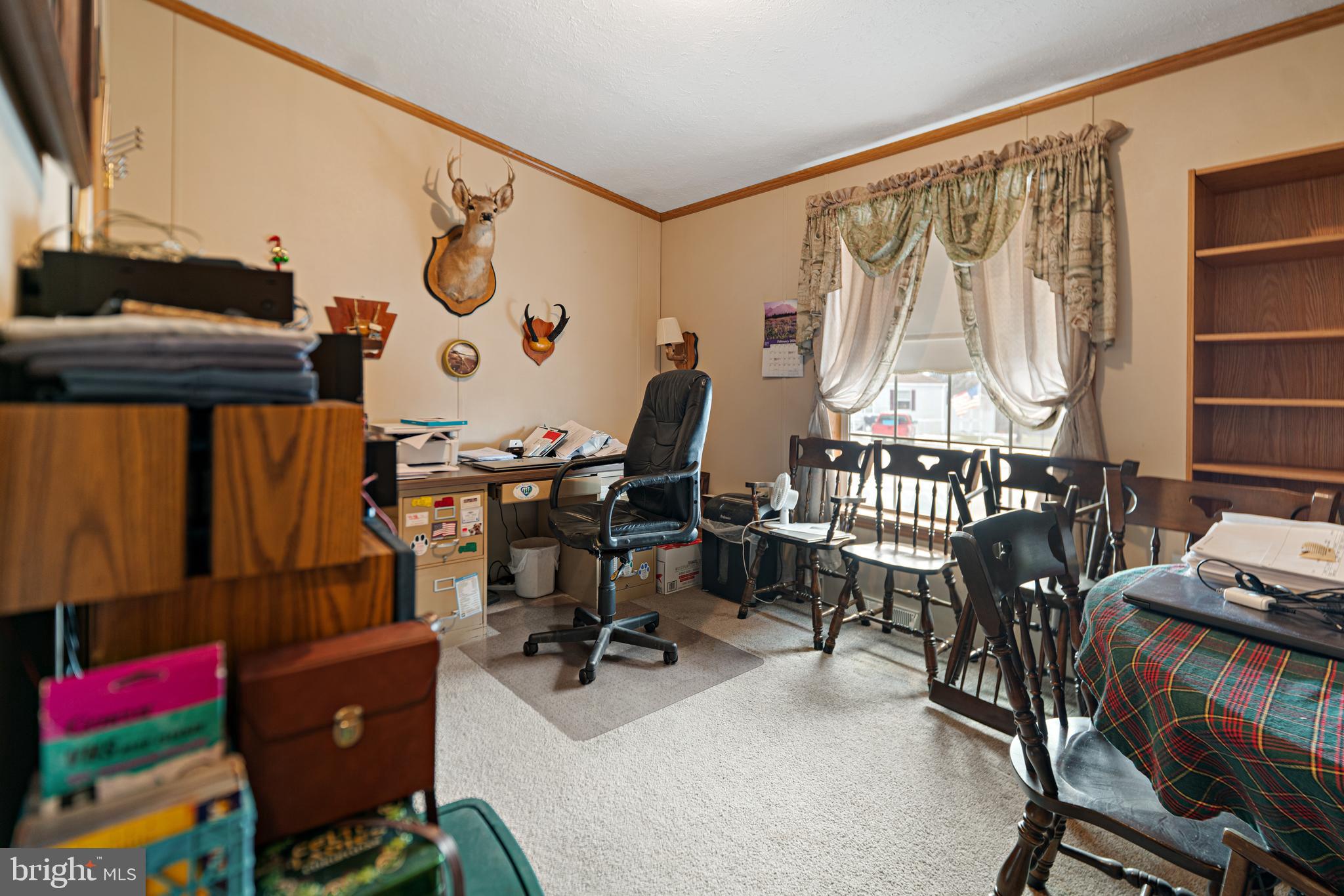 701 Cassel Road, Unit 107 Manchester, PA 17345 - Photo 16 of 21 a view of a workspace with furniture and a window