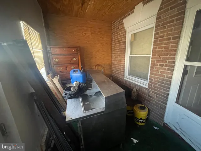 a bathroom with a sink and a window