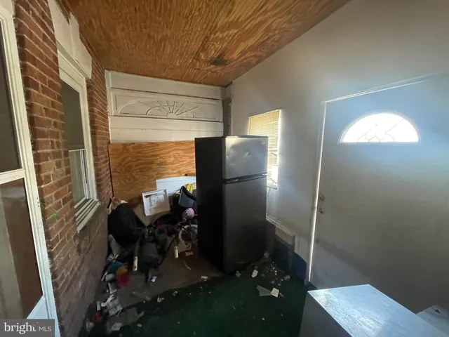 a view of a livingroom with furniture and storage