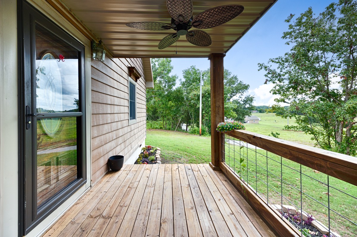 375 Kelley Road Prospect, TN 38477 - Photo 2 of 42 a view of porch with a swimming pool