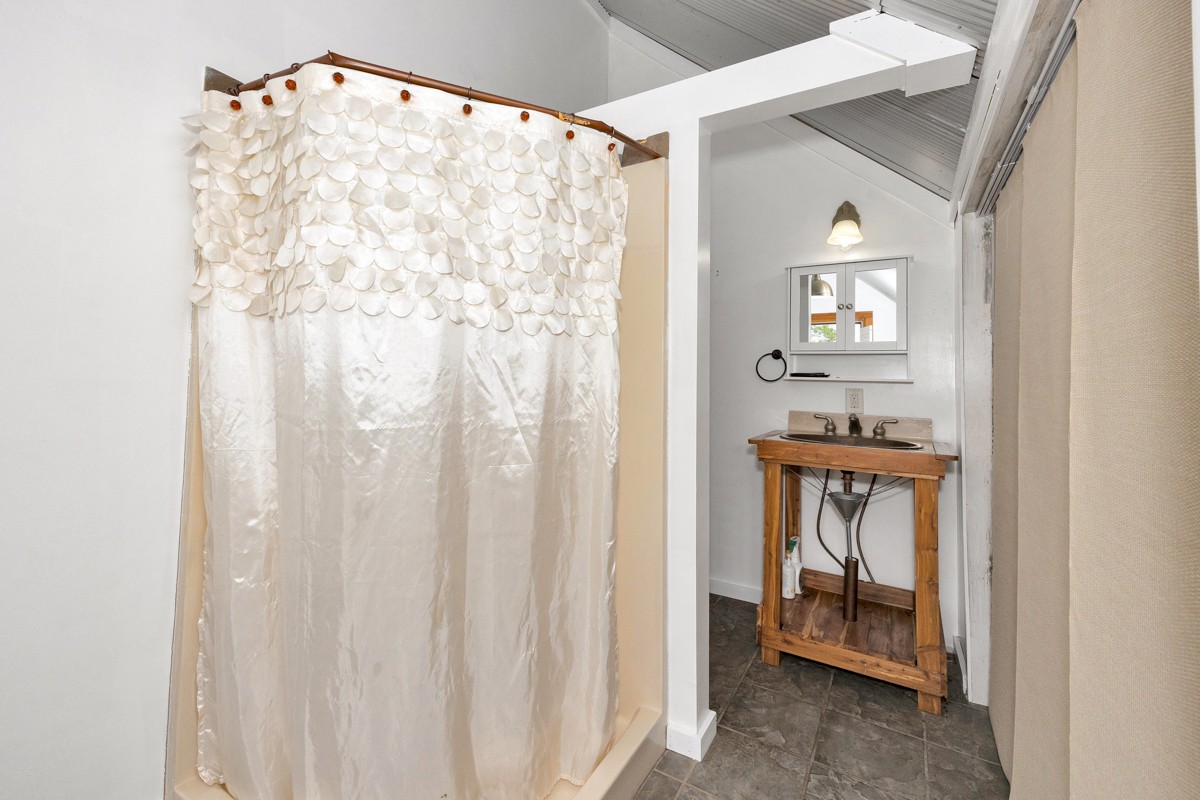 375 Kelley Road Prospect, TN 38477 - Photo 23 of 42 a bathroom with a sink and a mirror