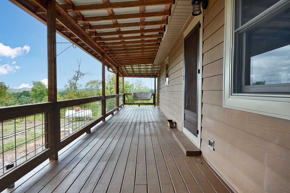375 Kelley Road Prospect, TN 38477 - Photo 32 of 42 a view of balcony with wooden floor