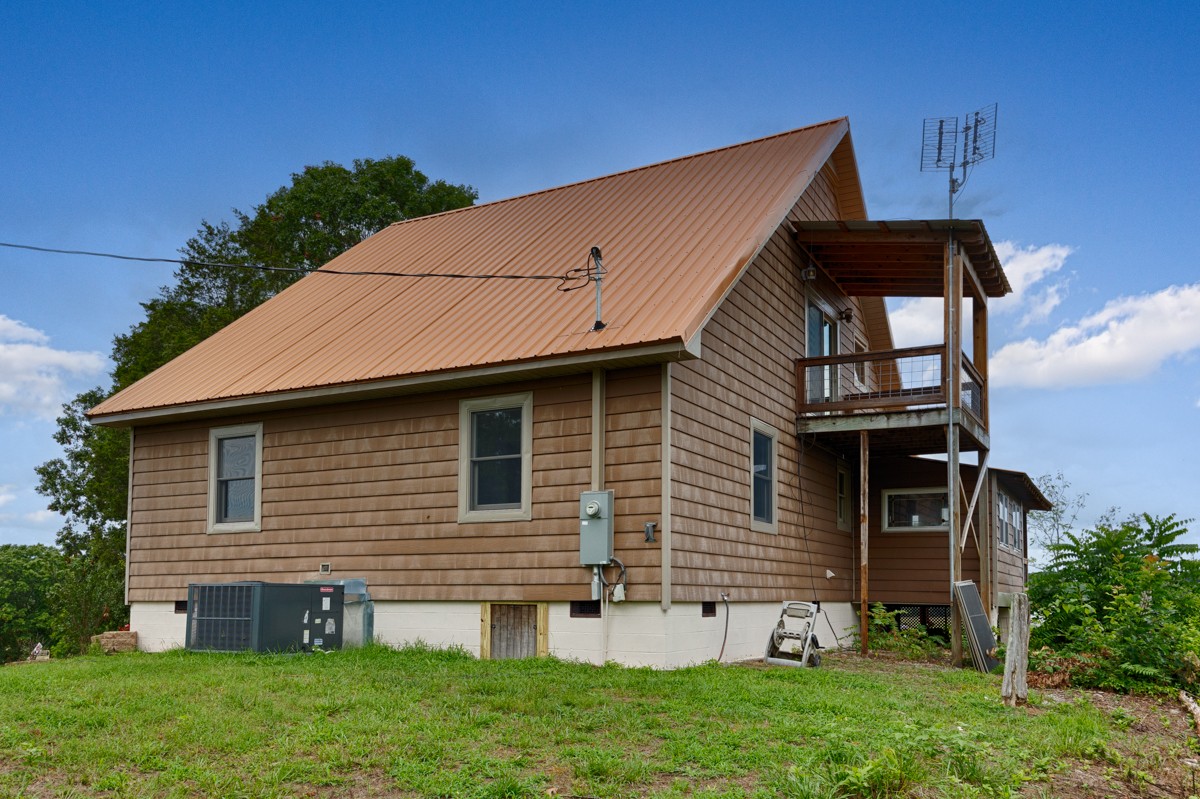 375 Kelley Road Prospect, TN 38477 - Photo 35 of 42 a front view of a house with garden
