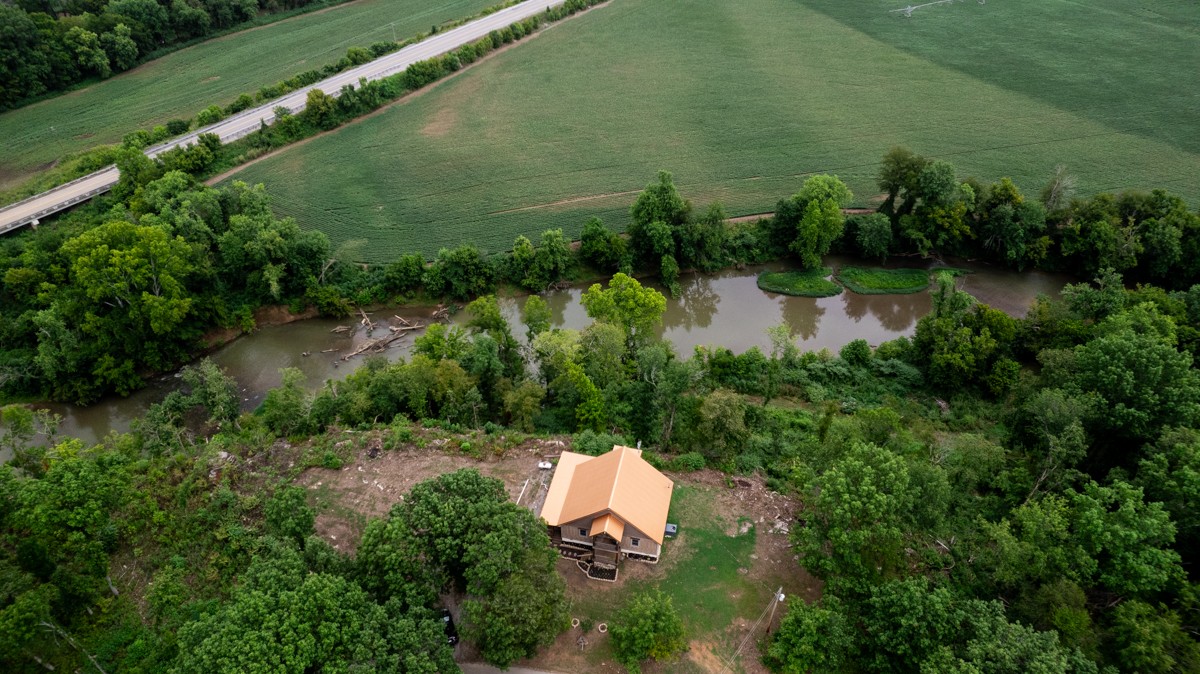 375 Kelley Road Prospect, TN 38477 - Photo 38 of 42 an aerial view of a house with a yard and lake view