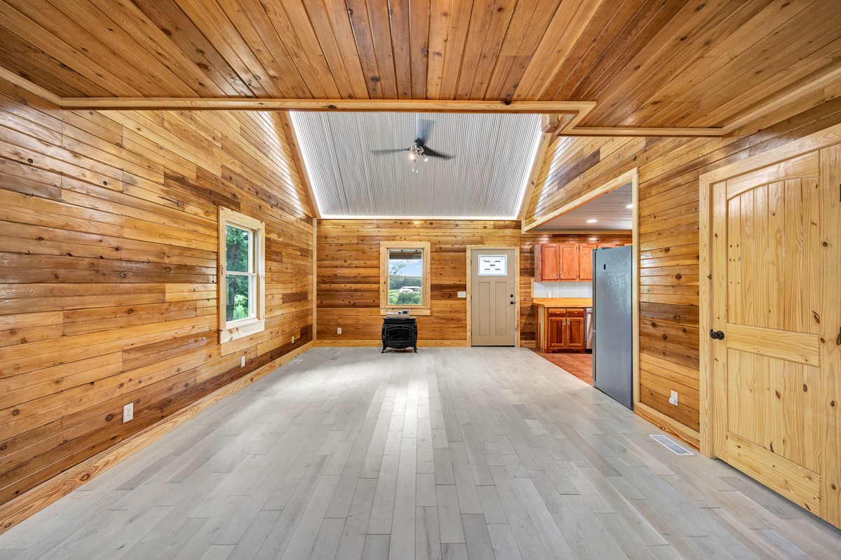 375 Kelley Road Prospect, TN 38477 - Photo 4 of 42 a view of a room with wooden walls