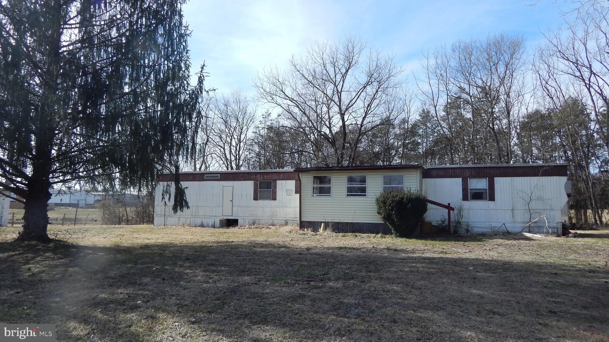 20470 Blackjack Road Culpeper, VA 22701 - Photo 4 of 7 a view of a house with large space