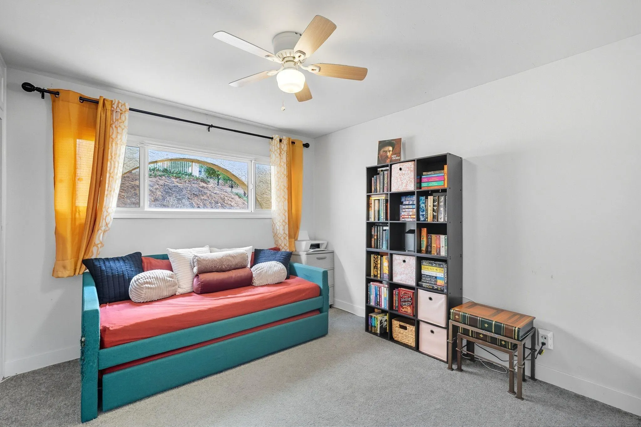 321 North Lane El Cajon, CA 92021 - Photo 20 of 44 a bedroom with a bed and a book shelf