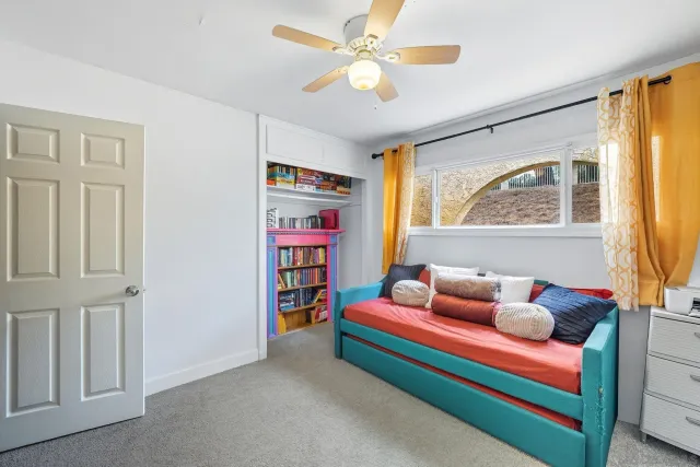 a living room with furniture and a window
