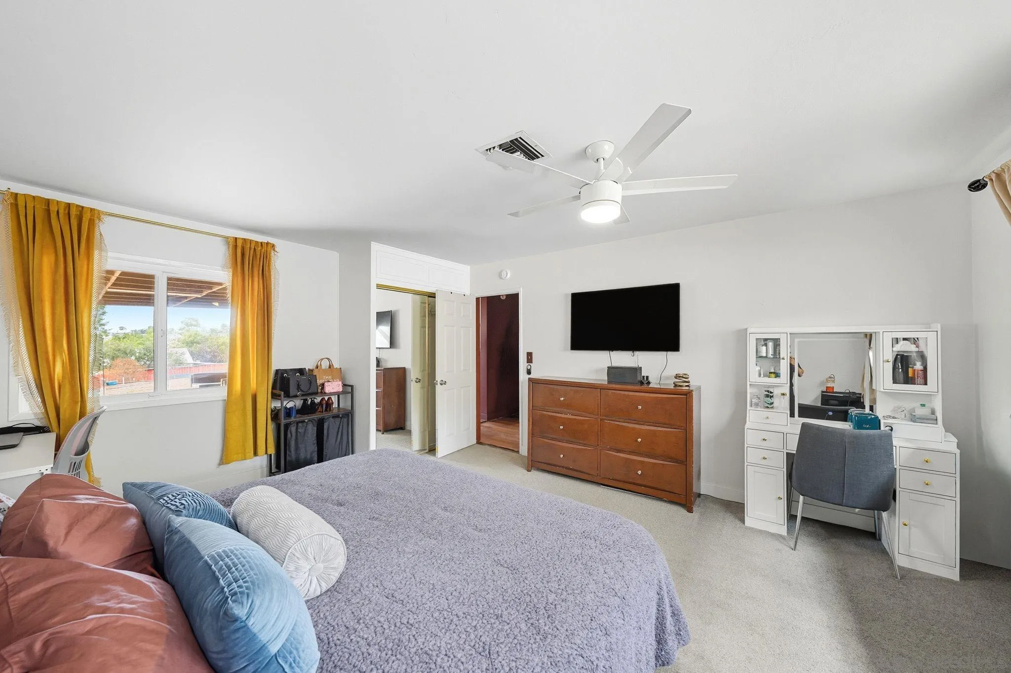 321 North Lane El Cajon, CA 92021 - Photo 24 of 44 a bedroom with furniture and a flat screen tv