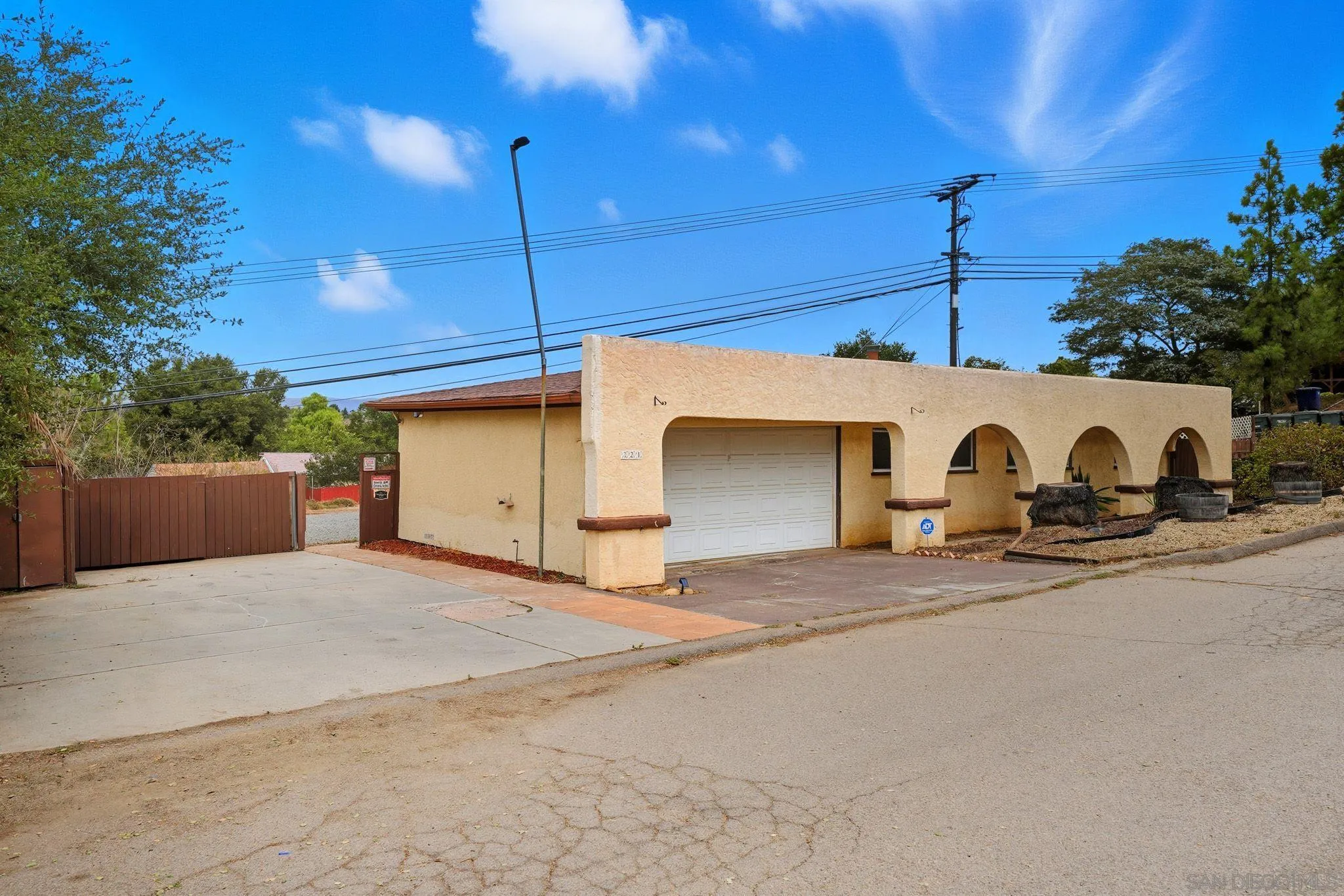 321 North Lane El Cajon, CA 92021 - Photo 3 of 44 a view of a house with a garage