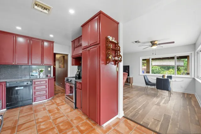 a view of kitchen with furniture and large window