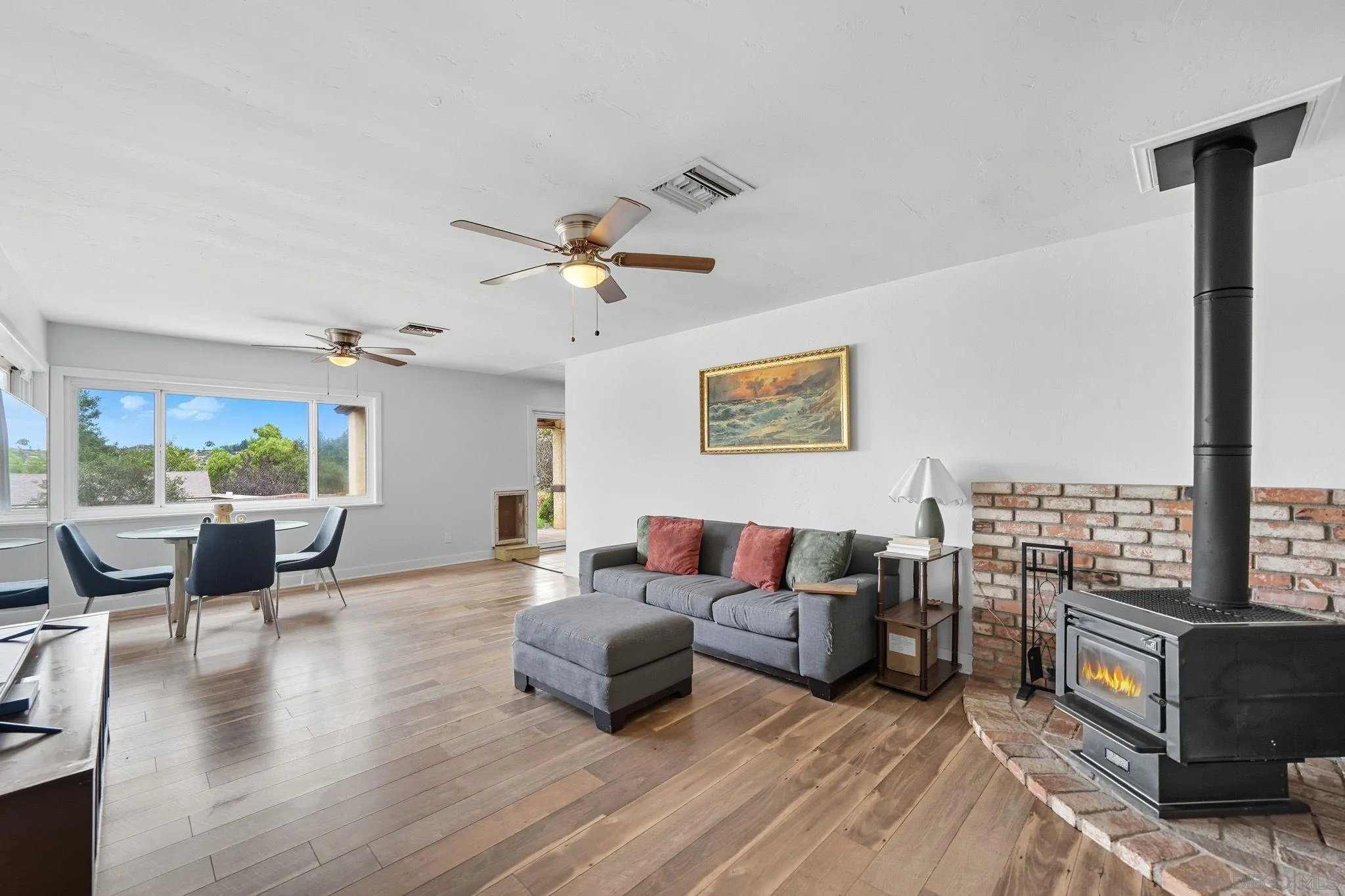 321 North Lane El Cajon, CA 92021 - Photo 5 of 44 a living room with furniture and a wooden floor