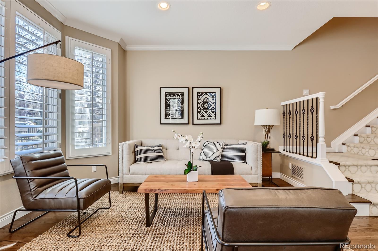 445 Jackson Street Denver, CO 80206 - Photo 11 of 29 a living room with furniture and a window