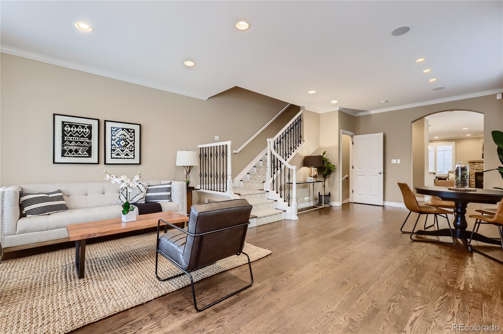 445 Jackson Street Denver, CO 80206 - Photo 12 of 29 a living room with furniture and wooden floor