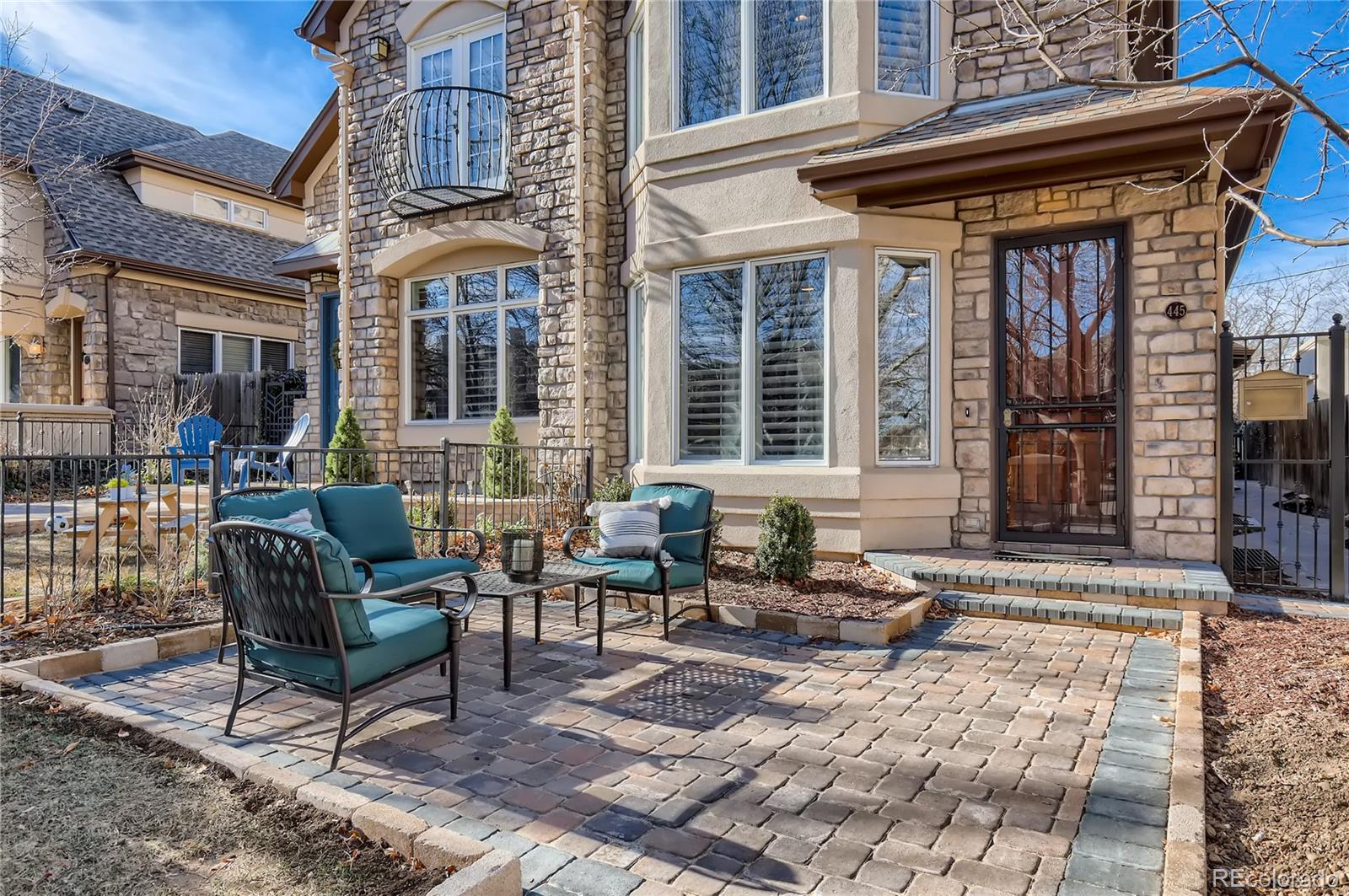 445 Jackson Street Denver, CO 80206 - Photo 2 of 29 a view of a building with sitting area