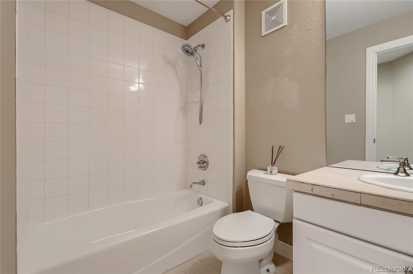 445 Jackson Street Denver, CO 80206 - Photo 23 of 29 a bathroom with a sink toilet and shower