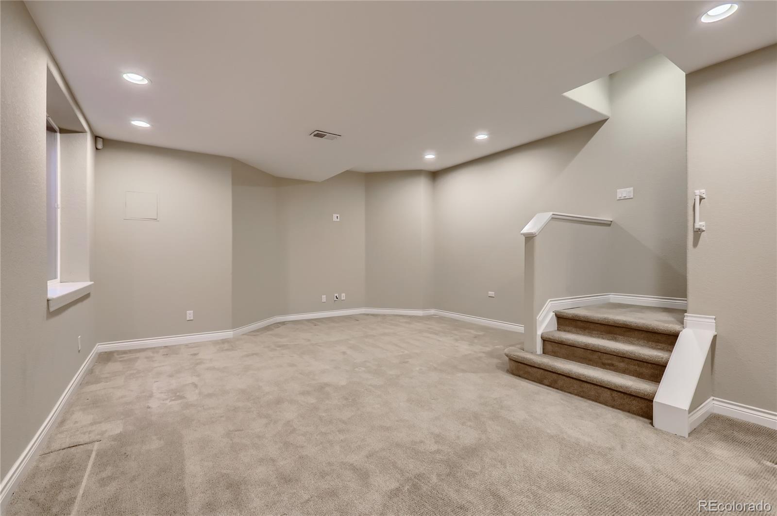 445 Jackson Street Denver, CO 80206 - Photo 24 of 29 a view of room with stairs and stairs