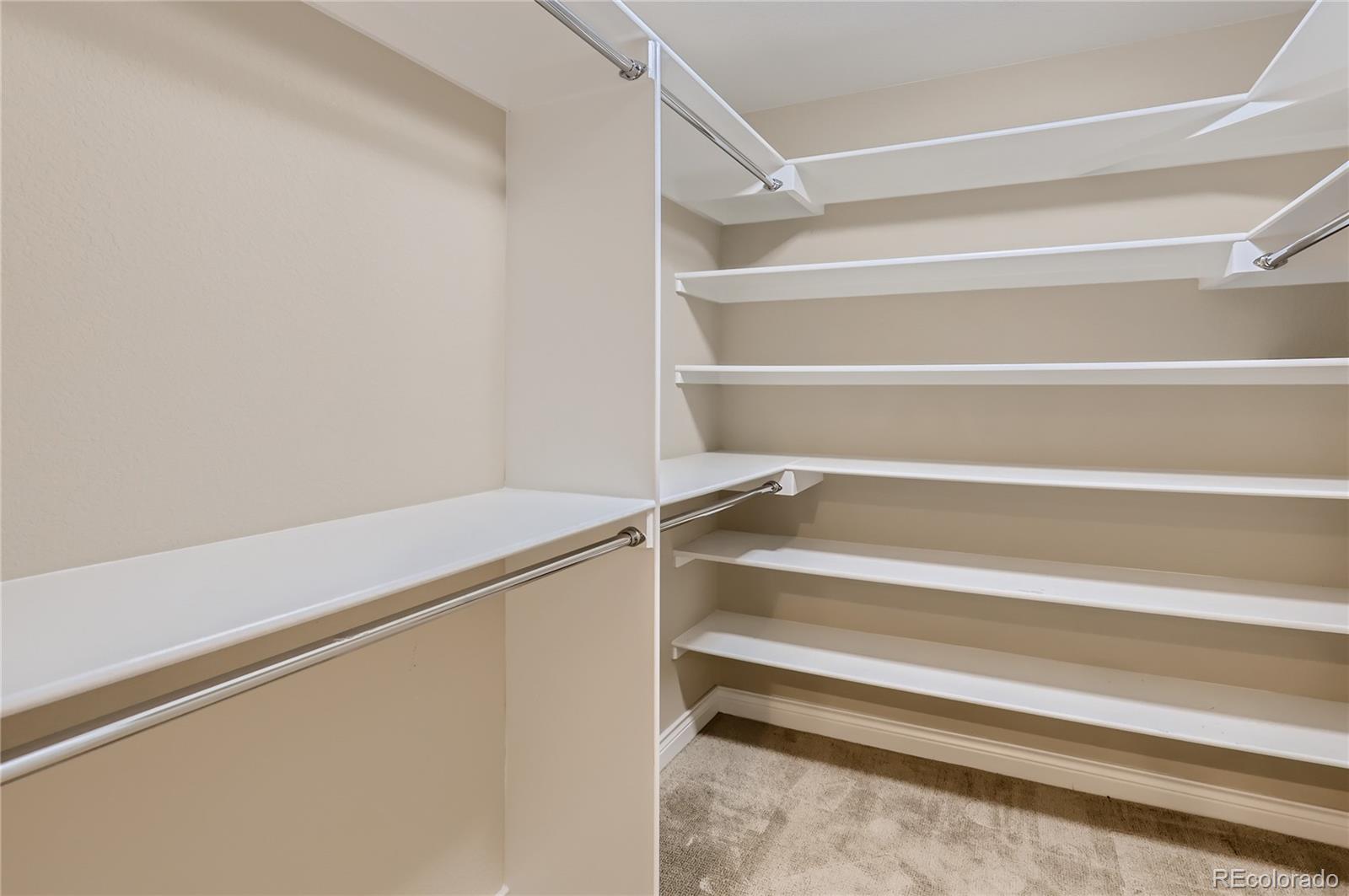 445 Jackson Street Denver, CO 80206 - Photo 25 of 29 a view of an empty walk in closet