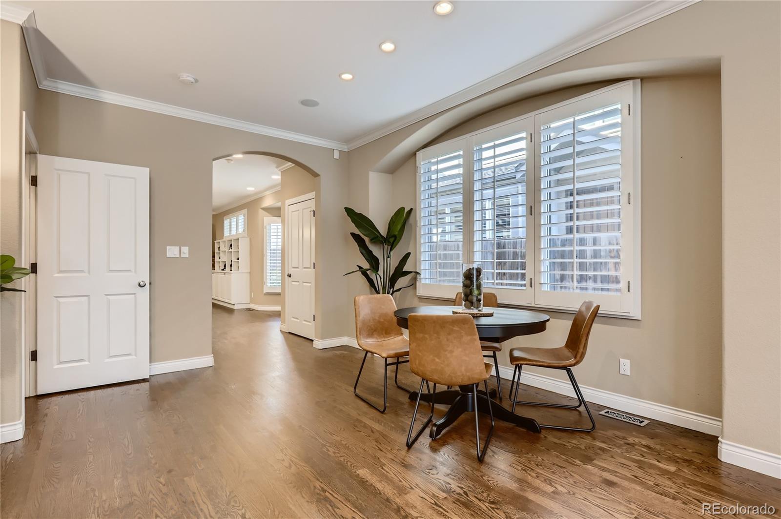 445 Jackson Street Denver, CO 80206 - Photo 10 of 29 a view of a livingroom with furniture and wooden floor