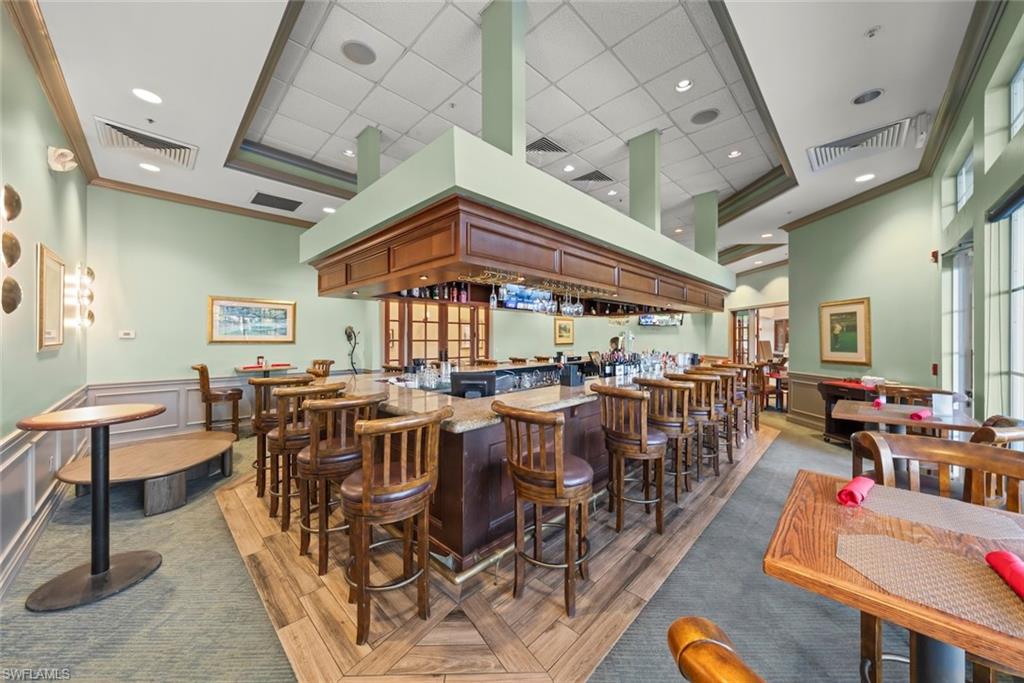 3653 Periwinkle Way, Unit 127 Naples, FL 34114 - Photo 41 of 44 a very nice looking living room with furniture