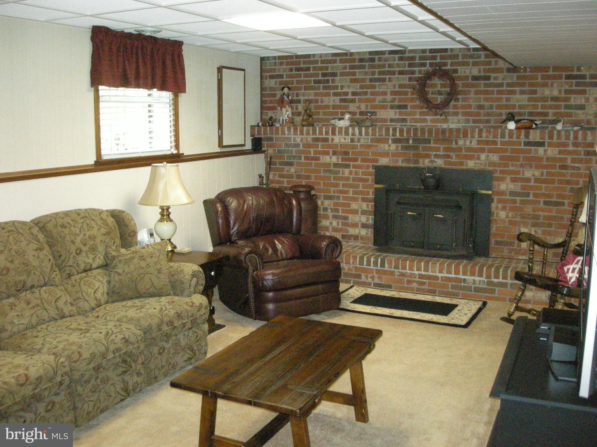 2208 Brookhaven Court Fallston, MD 21047 - Photo 18 of 30 Family Room has brick fireplace wall.