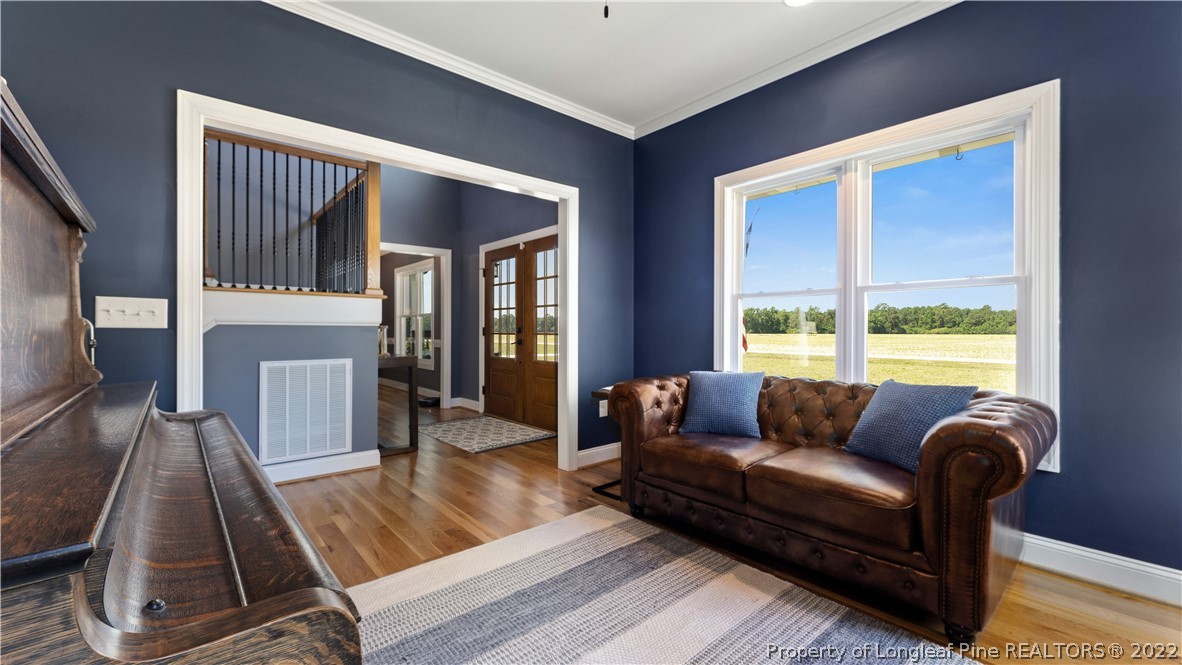 430 Mingo Church Road Dunn, NC 28334 - Photo 34 of 48 a living room with furniture and a flat screen tv
