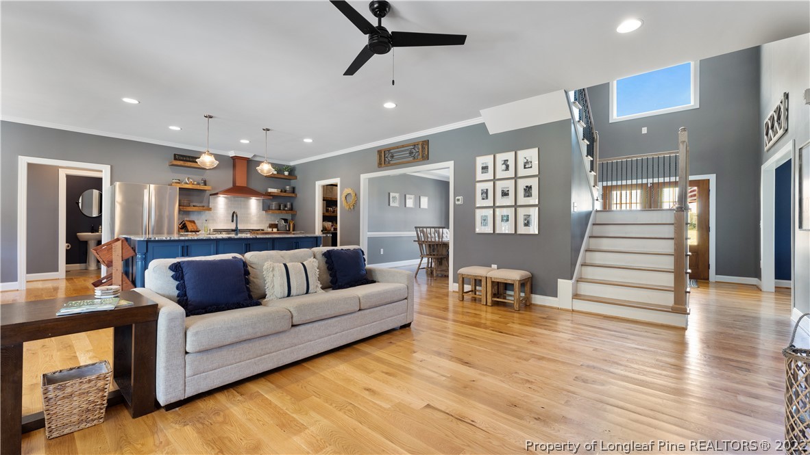 430 Mingo Church Road Dunn, NC 28334 - Photo 10 of 48 a living room with furniture and a wooden floor