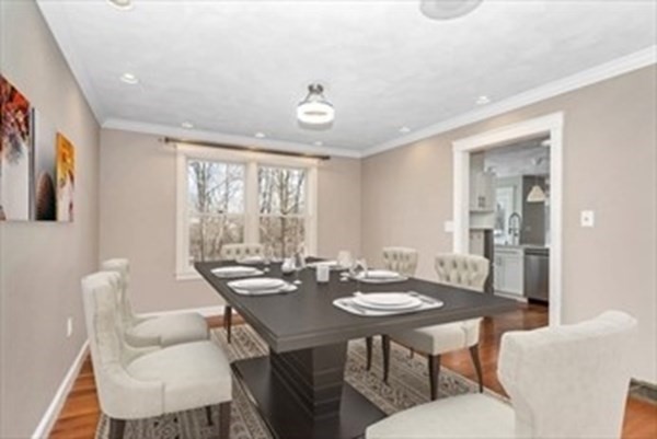 12 Hanson Lane Dracut, MA 01826 - Photo 15 of 23 a view of a dining room with furniture window and outside view