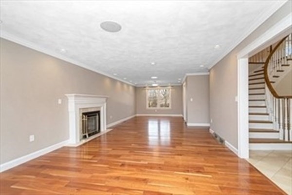 12 Hanson Lane Dracut, MA 01826 - Photo 20 of 23 a view of empty room with wooden floor