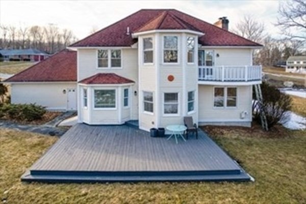 12 Hanson Lane Dracut, MA 01826 - Photo 3 of 23 a front view of a house with a yard
