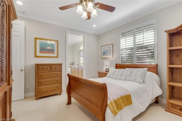 a bedroom with a bed and a desk