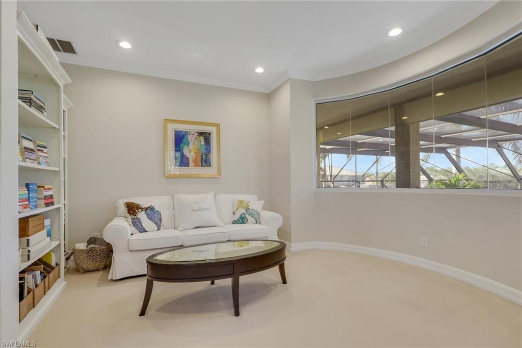 1859 Ivory Cane Point Naples, FL 34119 - Photo 29 of 50 Living area featuring carpet floors, recessed lighting, and ornamental molding