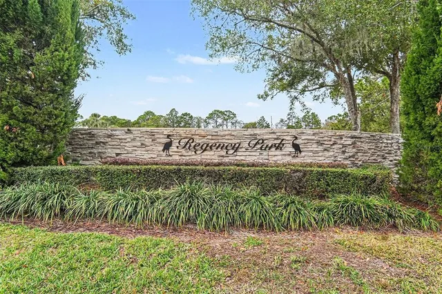 a view of outdoor space with garden and green space