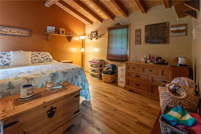 a bedroom with a bed and a closet