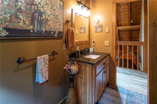 a utility room with multiple dryer and washer