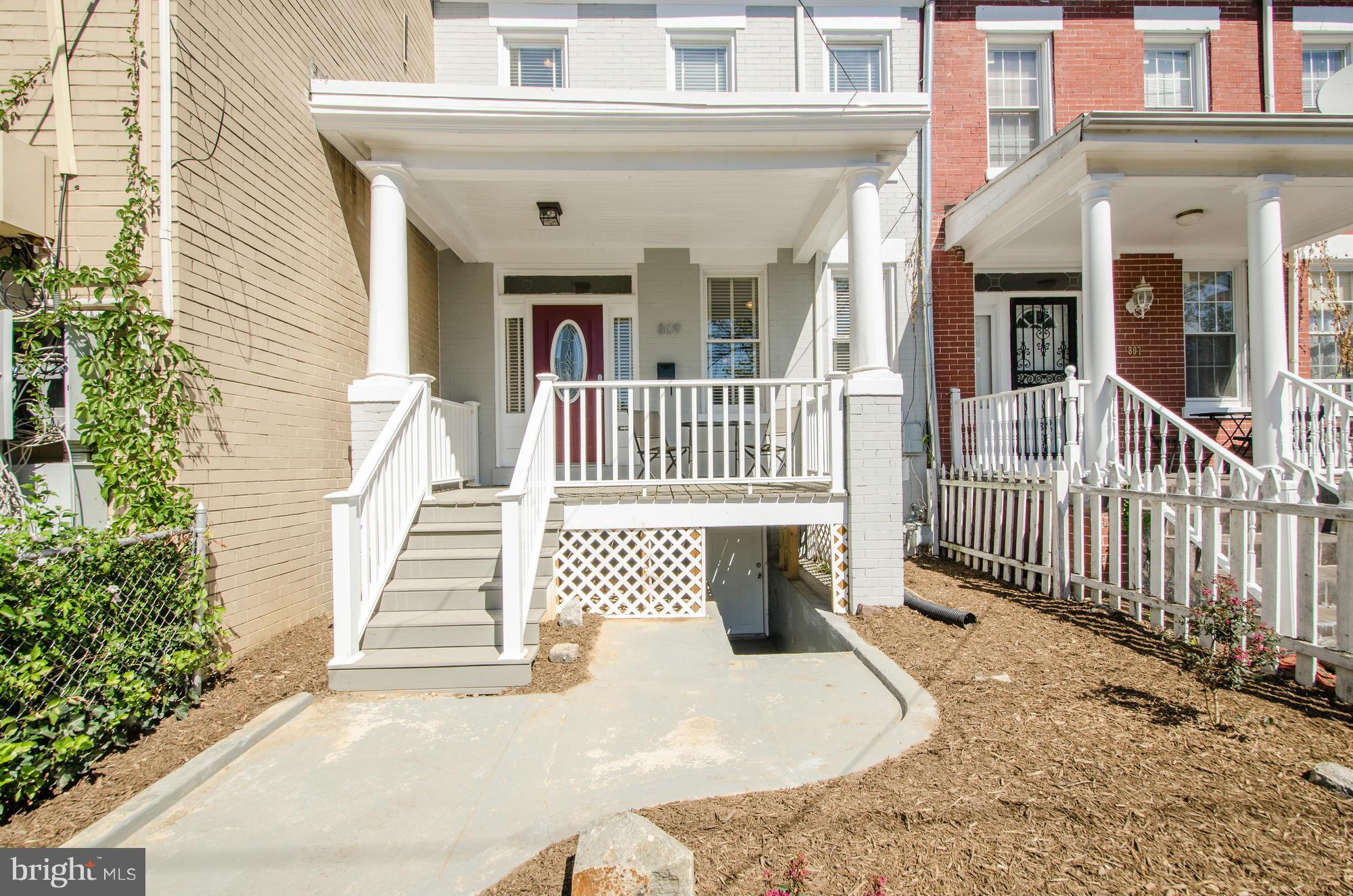 809 Jefferson Street Northwest Washington, DC 20011 - Photo 1 of 26 front view of a house with a porch