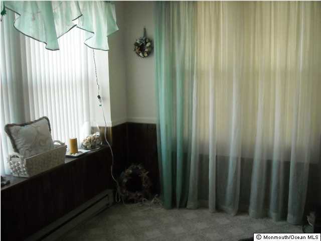 18A Sunset Road, Unit A Whiting, NJ 08759 - Photo 3 of 3 a living room with furniture