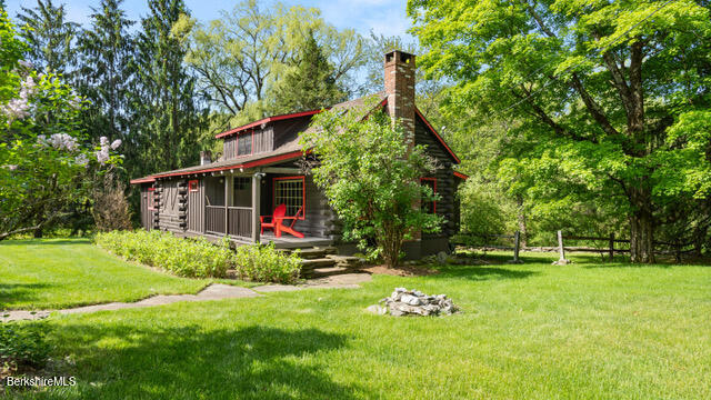 137 E Road Alford, MA 01266 - Photo 1 of 32 a view of a house with backyard and garden