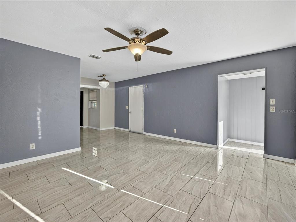 1068 Peter Road Daytona Beach, FL 32114 - Photo 5 of 37 a view of an empty room